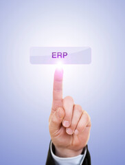 Businessman is Pushing On ERP Button Against Blue