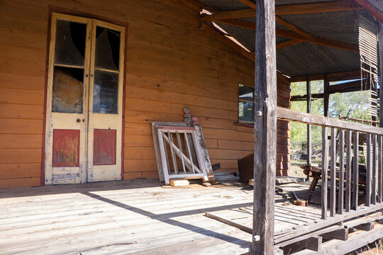 Veranda Of An Old Abandoned Wooden Queenslander House In The Outback Queensland, Australia Now Derelict.