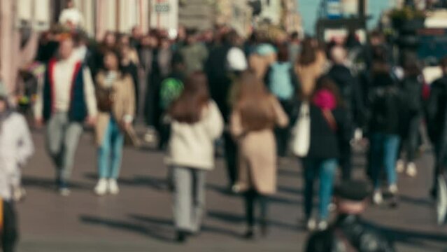 residents of the city walk along the street, a crowd of people walk around the city