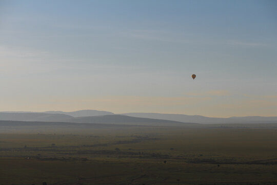 Hot Air Balloon over Mountains