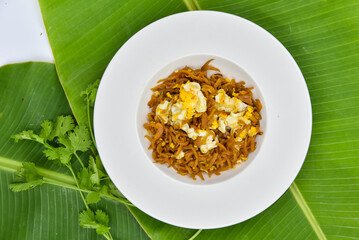 Stir-fried Preserved Radish with Egg - Thai food, top view on white background.