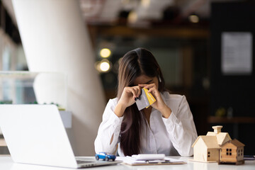 Women are stressed and worried about overspending. Concept of financial problems.