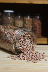 Jar of Pinto Beans Spilled on Kitchen Table