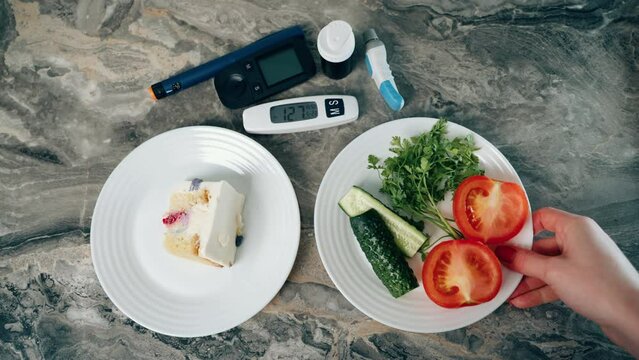 Diabetic devices - glucometer, lancet and insulin. Piece of cake and fresh vegetables. Dilemma of choosing between healthy food and delicious sweets. High sugar. Adherence to diet and healthy eating