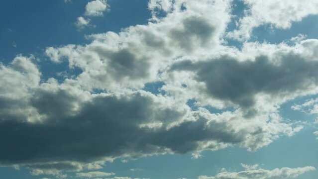 Gray White Cumulus Clouds in Blue Sky, Time Lapse. Beautiful Summer Cloudy Sky During Day. Weather, Forecast, Atmosphere, Air, Azon Layer, Climate, Sky Height.