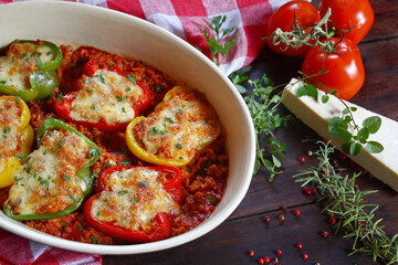 Stuffed paprika with meat, rice, vegetables and cheese
