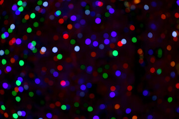 Naklejka premium Colorful bokeh in the night light for background