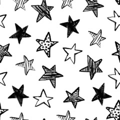 Seamless pattern with hand drawn textured stars