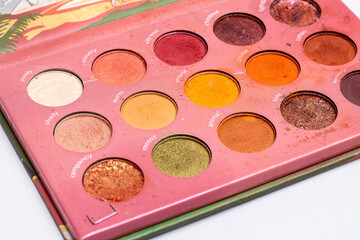 Mua and girly concept. Eyeshadow palette on white background.