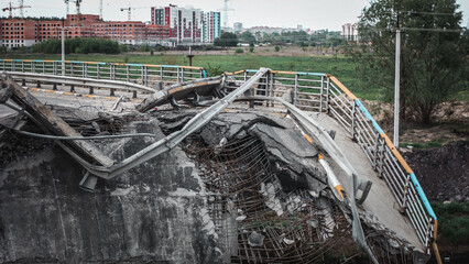 Irpin, Kyiv region,  Ukraine - 19.05.2022: Cities of Ukraine after the Russian occupation. destroyed bridge during the evacuation from the city of Irpin, northwest of Kyiv
