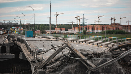 Irpin, Kyiv region,  Ukraine - 19.05.2022: Cities of Ukraine after the Russian occupation. destroyed bridge during the evacuation from the city of Irpin, northwest of Kyiv