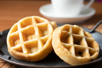 Breakfast vanilla waffles on a tray