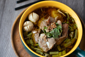 Braised pork kaolao with morning glory and sprouts, local Thai food