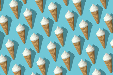 Seamless pattern of white ice creams isolated on blue background. Pattern design for banner, poster, flyer, card, postcard, cover, brochure. Many white ice creams with shadow rendering 3D.