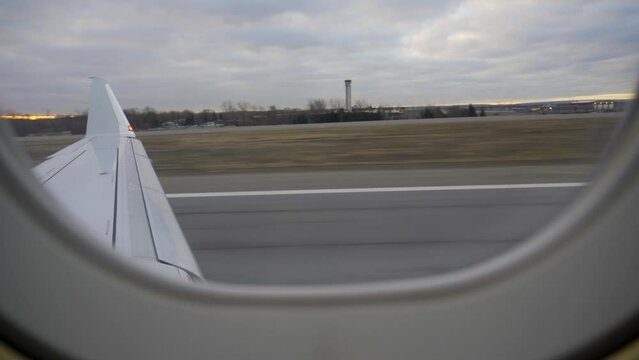 Airplane taking off from Buffalo International Airport and flying to San Jose California as captured from window seat.