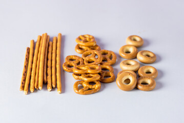 Heaps Variety of Tasty Crackers on Blue Background. Cookies background Top View