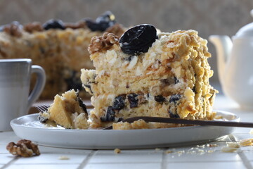 Tasty cake with plums and cream