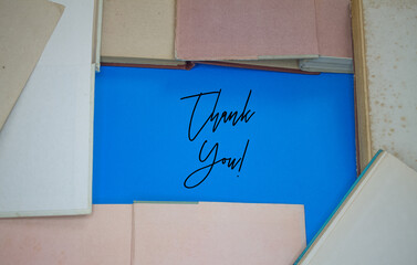 Thank You word in opened book with vintage, natural patterns old antique paper design.