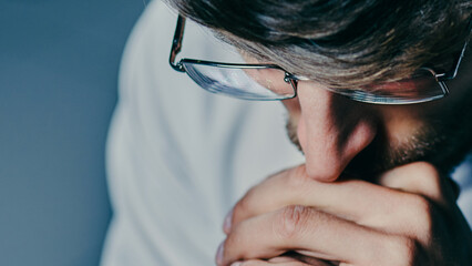 crypto trader reflecting on the risks of investing funds