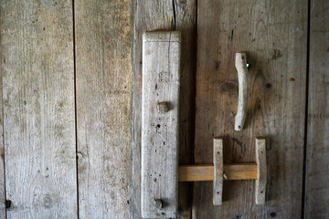 old wood shutter on a wooden doors