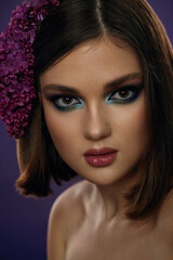 Portrait of a beautiful young girl with exquisite fantasy make-up