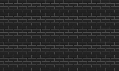 Fototapeta na wymiar Wall brick background, black color, soft texture