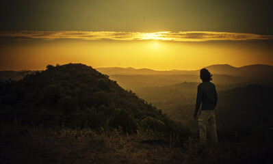 silhouette of a person in the sunset