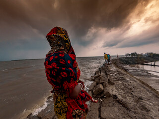 person standing nearby the river