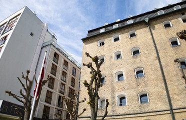  House facades in Copenhagen, Denmark. City street with old house. Real estate investment. Expensive housing in the center of the city.