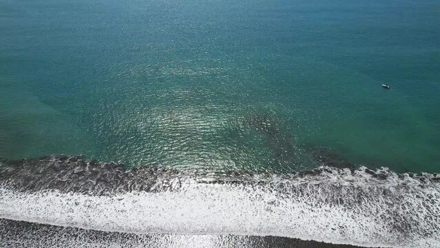 Aerial images of the beach on a sunny day, Aerial drone images, Beach Jaco, Puntarenas, Costa Rica, Dolly Tilt.