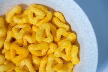 
snacks and chips on a white plate close-up