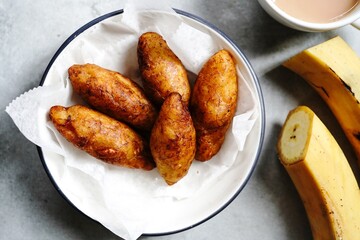 Unnakkaya - Kerala Malabar snack with ripe plantains and coconut nut filling, selective focus