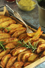 A tray with potatoes backed in oven