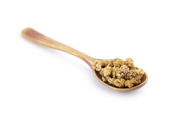 Mulberry dry berries morus alba in wooden spoon isolated on white