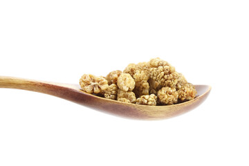 Mulberry dry berries morus alba in wooden spoon isolated on white