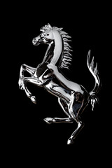 Obraz na płótnie Canvas Metal horse on black background..