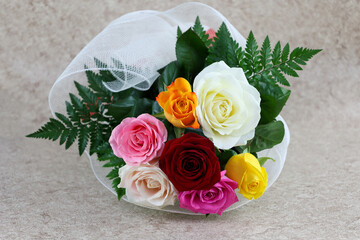 multicolored roses in elegant bouquet isolated