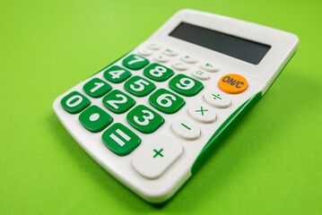 calculator on green background