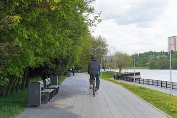 Man riding bicycle in the public park