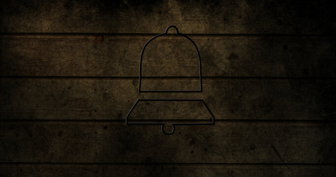 Image of glowing neon bell icon on brick wall
