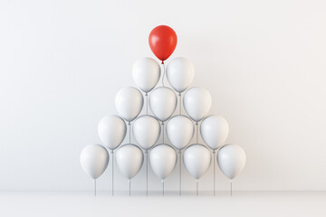 Leadership and business success concept with pyramid of white balloons and red balloon on the top on abstract light background. 3D rendering