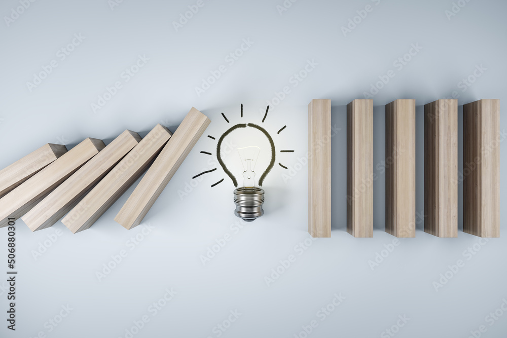Poster business crisis and risk protection concept with light bulb stopping wooden pieces of a domino effec