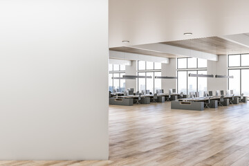 Blank light wall part at the entrance to open space sunny office with modern dark work places furniture, wooden ceiling and floor and city view from huge windows. 3D rendering, mockup