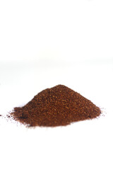 a pile of paprica isolated on white background