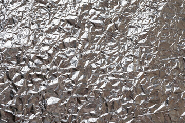 Shiny metal silver foil texture for background, Abstract crumpled foil background, metallic foil texture