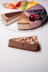 Piece of cake with chocolate and nuts. Sweet dessert.