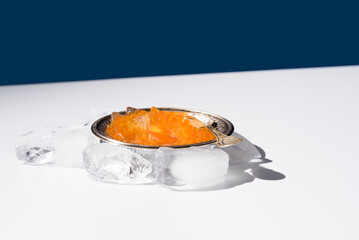 Tobiko caviar served on silver plate