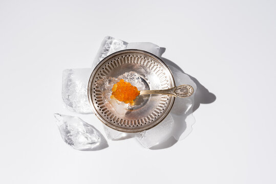 Tobiko caviar served on silver plate