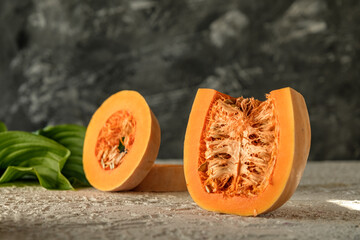 pieces of pumpkin on white concrete, pear-shaped pumpkin rings, homemade vegetables, pumpkin photo for magazine