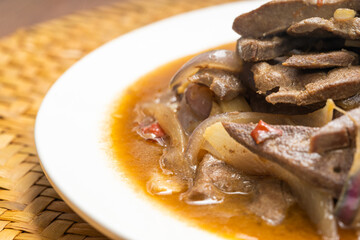 Sichuan-style home cooking - fried pork liver with onions